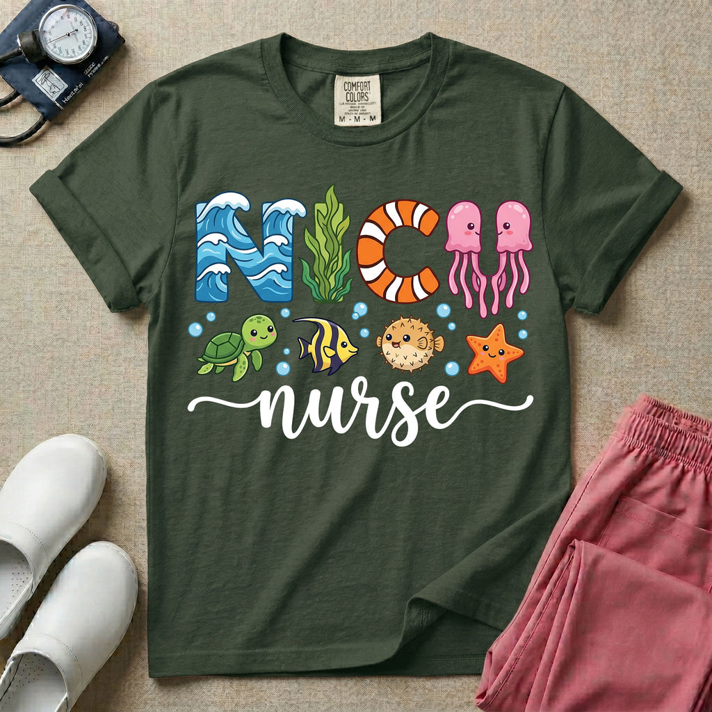 A cute t-shirt for NICU nurses featuring the text "NICU nurse" where the letters are designed with ocean elements like waves, seaweed, and a jellyfish, surrounded by under the sea creatures including a sea turtle, tropical fish, pufferfish, and starfish.