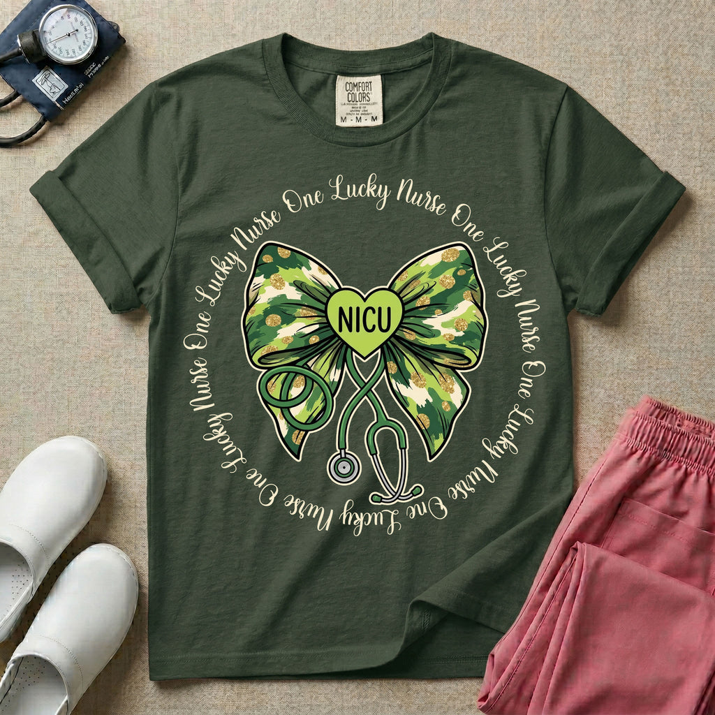 A graphic for a Neonatal Intensive Care Unit featuring a green camouflage bow with a stethoscope dangling from the bottom, a green heart in the center reading 'NICU', and the phrase 'One Lucky Nurse' repeating in a circle around the design.
