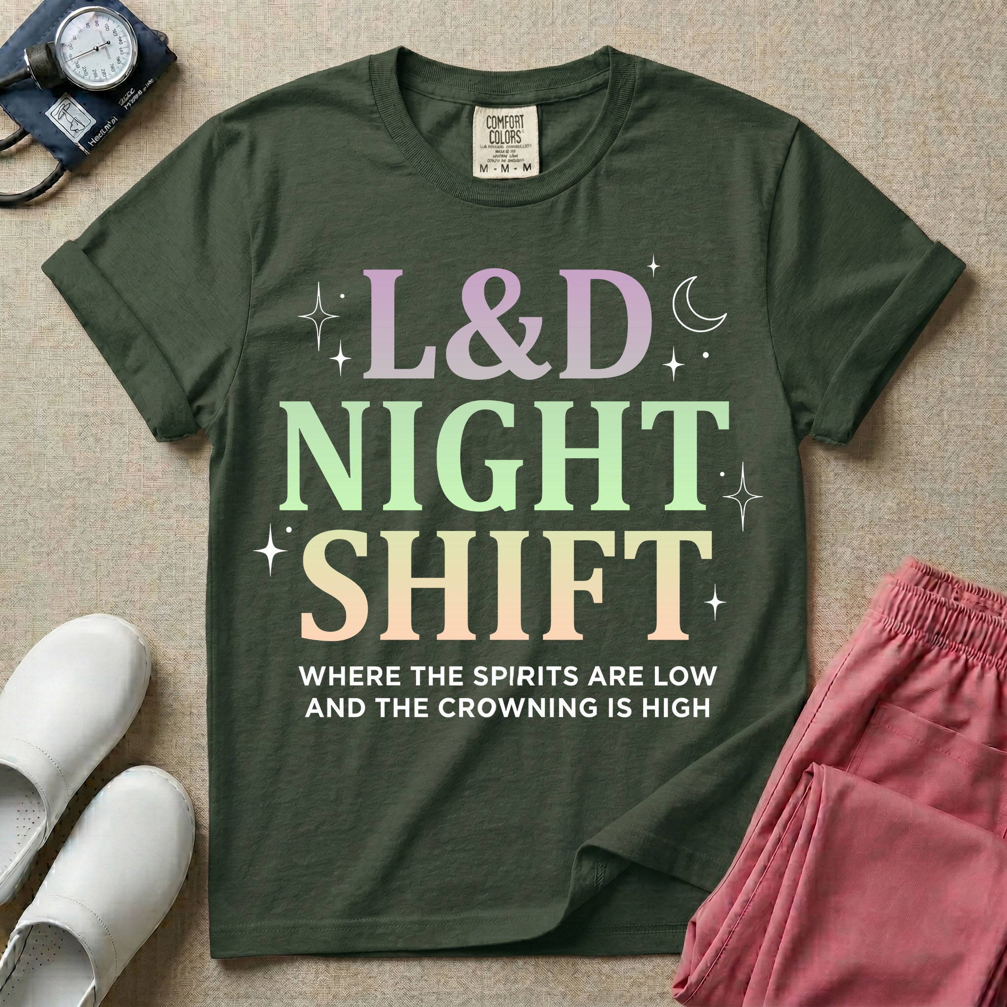 Labor and Delivery L&D night shift nurse t-shirt with pastel typography where the spirits are low and the crowning is high graphic in moss color.