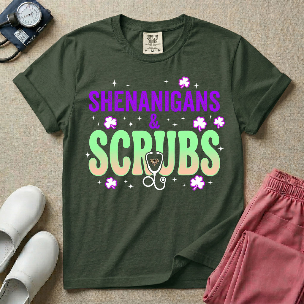 General nursing St. Patrick's Day t-shirt featuring a retro wavy font with the text "SHENANIGANS & SCRUBS" surrounded by shamrock graphics and a stethoscope.