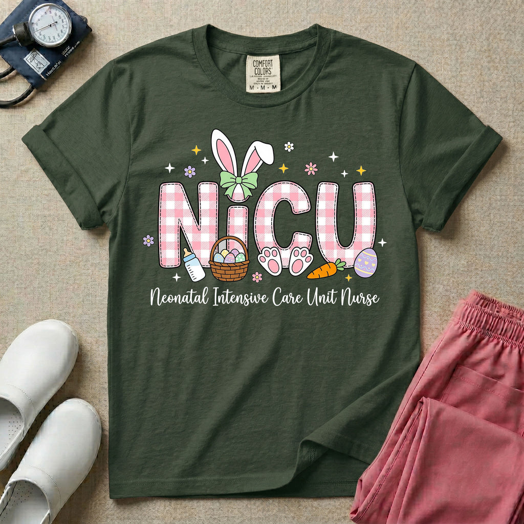 Neonatal Intensive Care Unit NICU nursing t-shirt featuring the letters NICU in a pink plaid pattern with bunny ears on the I, alongside a basket and Easter eggs, positioned above the cursive text "Neonatal Intensive Care Unit Nurse".