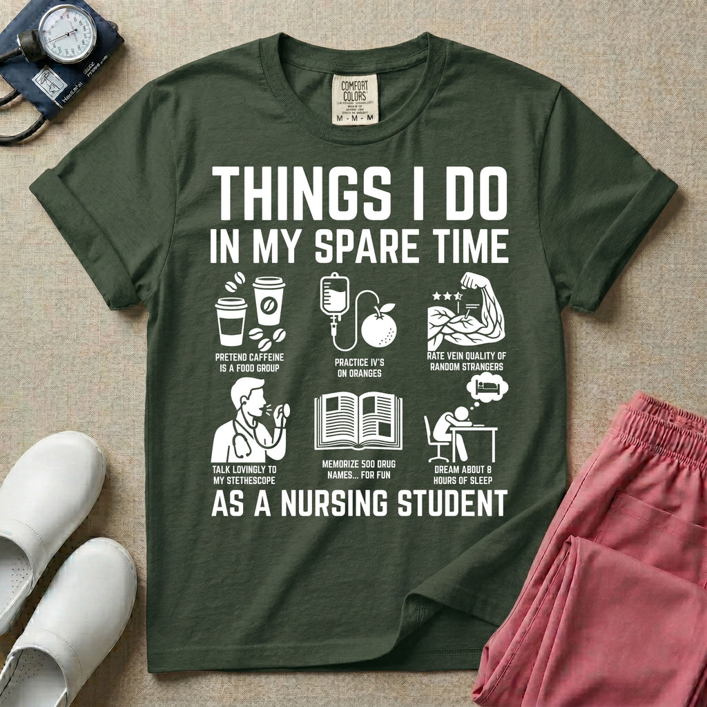 A t-shirt featuring the text THINGS I DO IN MY SPARE TIME AS A NURSING STUDENT surrounded by humorous line-art icons depicting studying, drinking coffee, and lacking sleep.