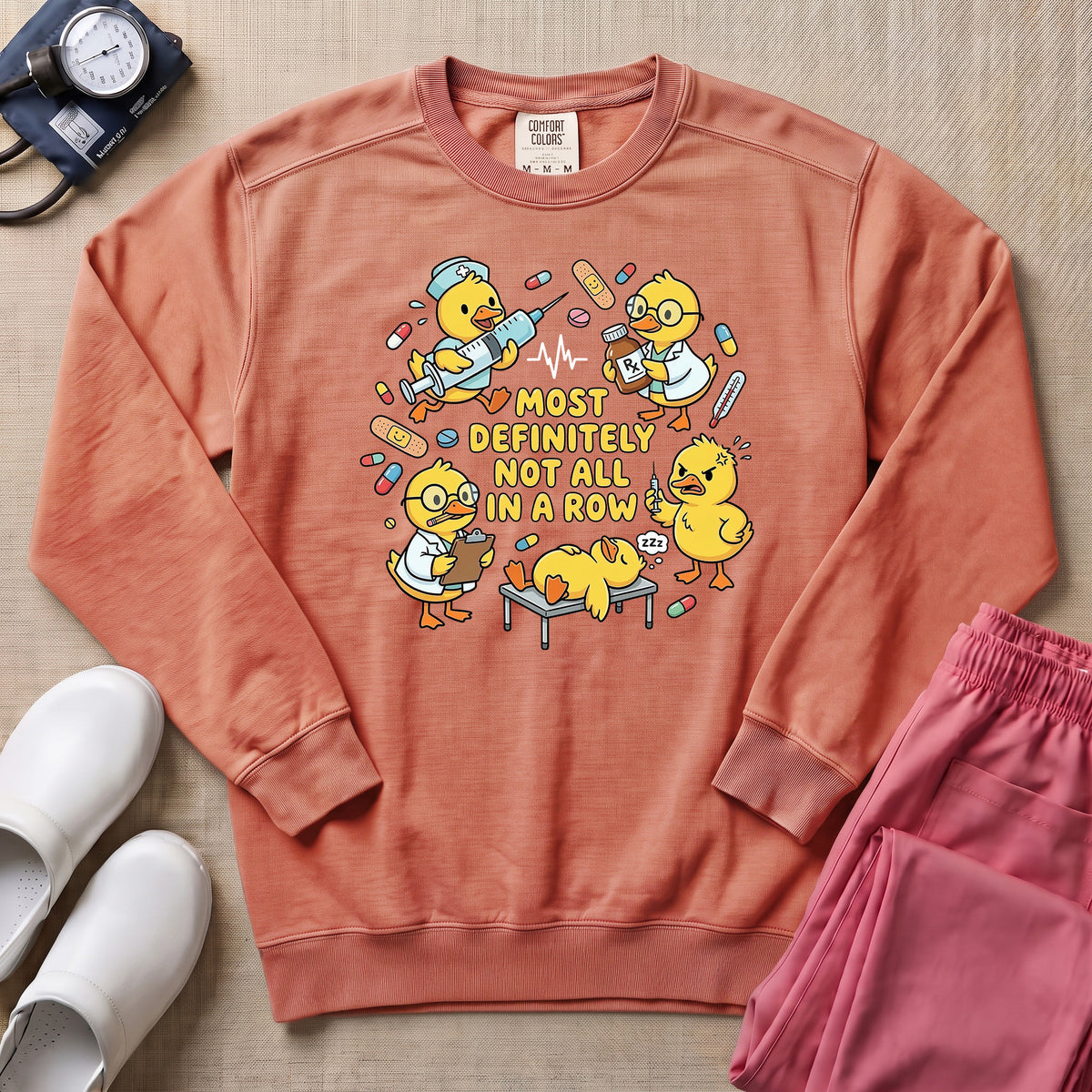 Most Definitely Not All In A Row Funny Duck Nurse Gift Sweatshirt - Terracotta Comfort Colors Sweatshirt | HugTee