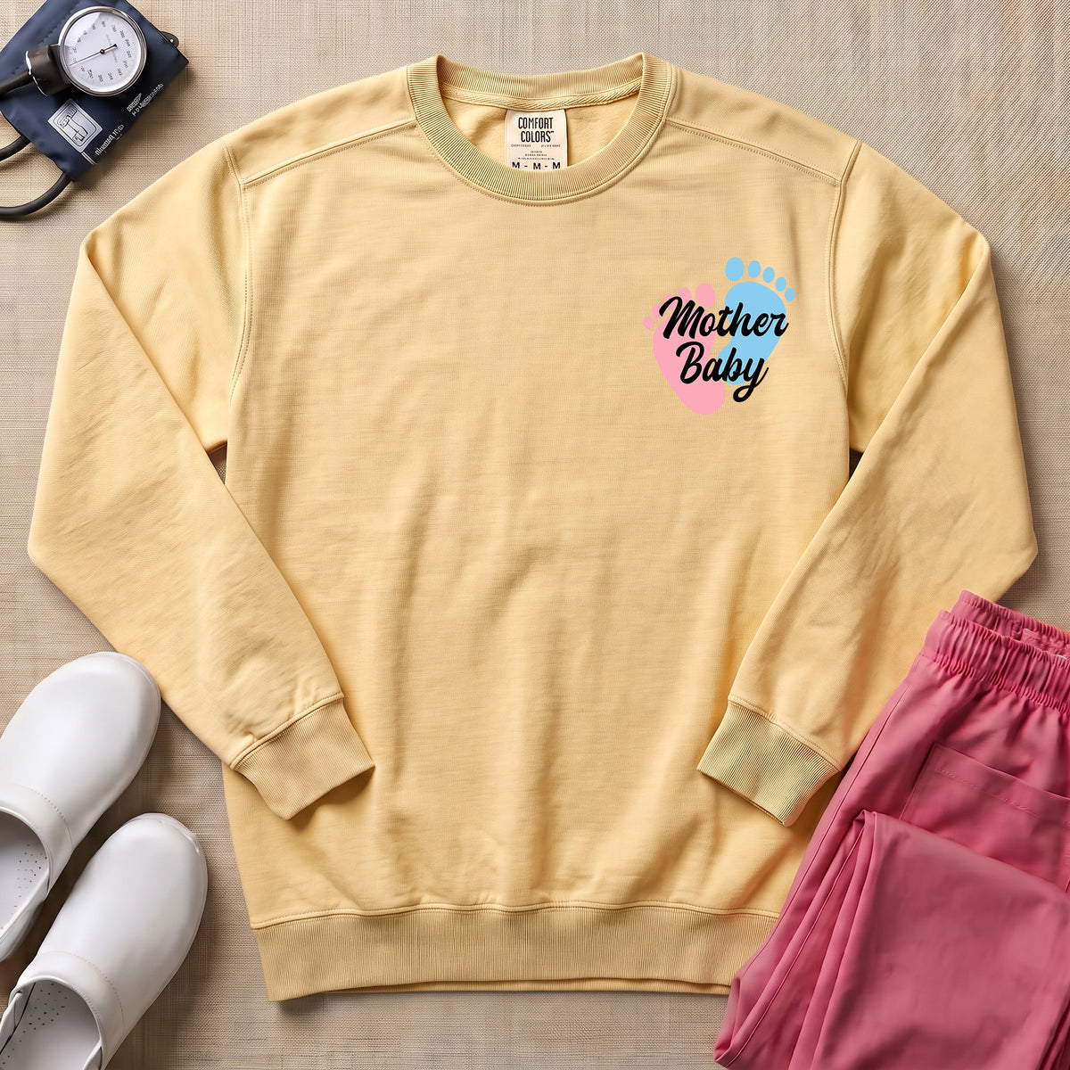 Mother Baby Footprints Postpartum Nurse Sweatshirt - Butte Comfort Colors Sweatshirt | HugTee