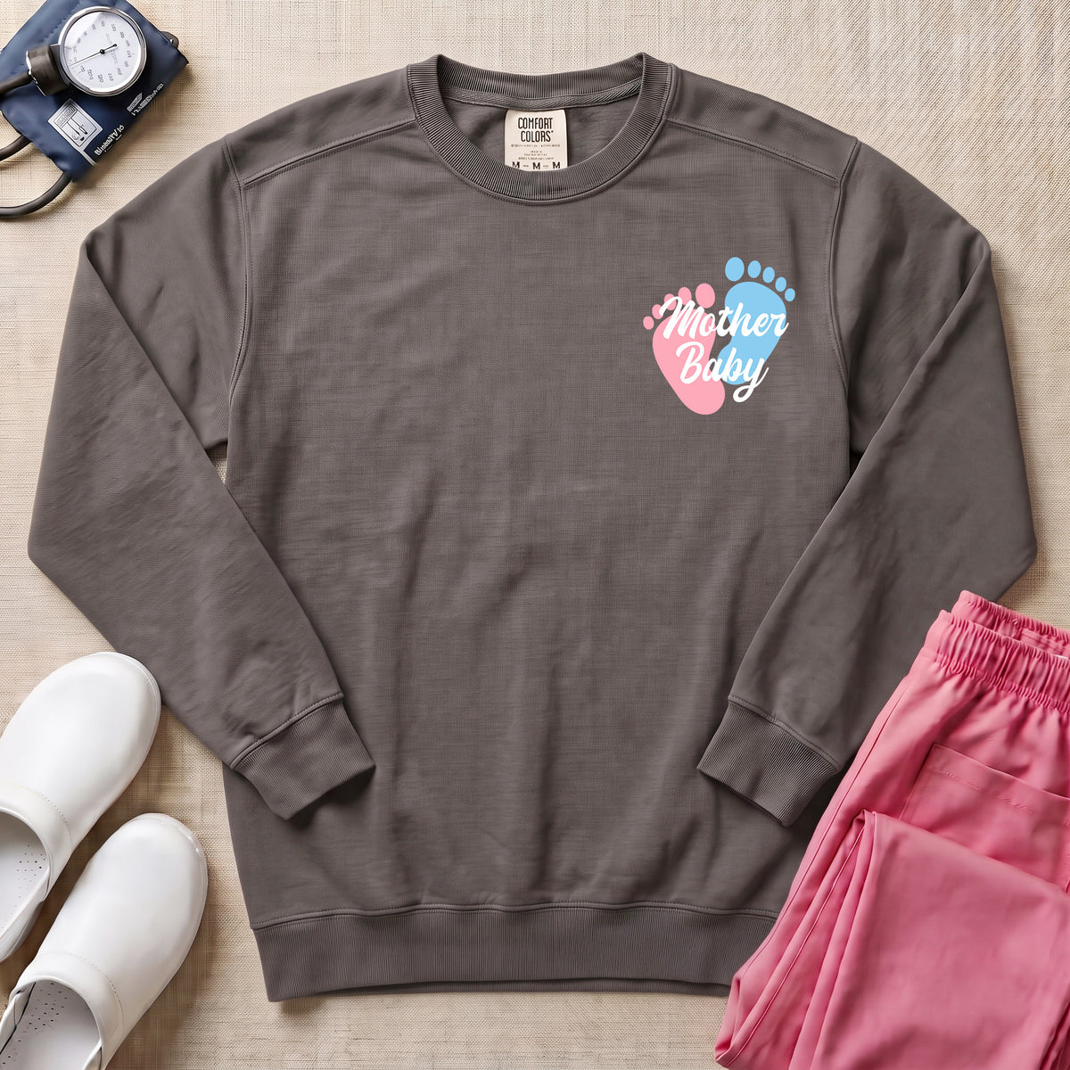 Mother Baby Footprints Postpartum Nurse Sweatshirt - Pepper Lifestyle Hero Mockup | HugTee