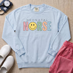 Retro Neonatal Nurse Smiley Face NICU Sweatshirt - Chambray Comfort Colors Sweatshirt | HugTee