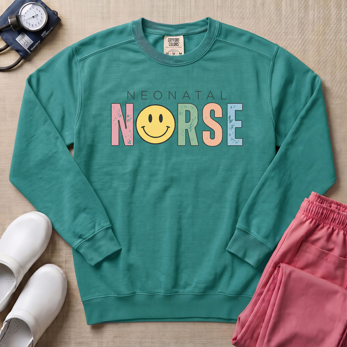 Retro Neonatal Nurse Smiley Face NICU Sweatshirt - Seafoam Comfort Colors Sweatshirt | HugTee