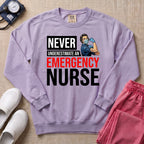 Never Underestimate An Emergency Nurse Retro ER Sweatshirt - Orchid Comfort Colors Sweatshirt | HugTee