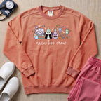 Cute Kawaii NICU Boo Crew Halloween Nurse Sweatshirt - Terracotta Comfort Colors Sweatshirt | HugTee