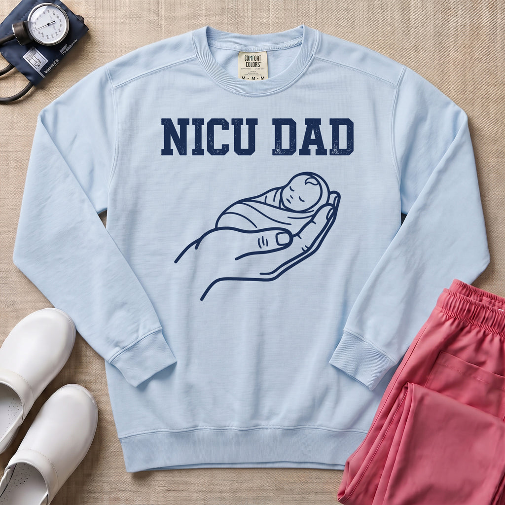Proud NICU Dad Cradling Baby Line Art Minimalist Sweatshirt - Chambray Comfort Colors Sweatshirt | HugTee