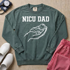 Proud NICU Dad Cradling Baby Line Art Minimalist Sweatshirt - Blue Spruce Comfort Colors Sweatshirt | HugTee
