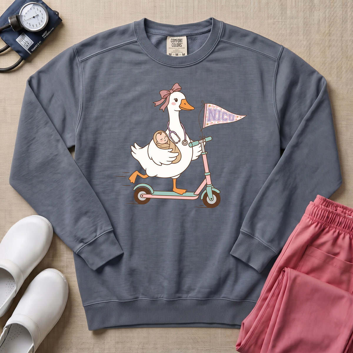 Coquette Goose Riding Scooter NICU Nurse Sweatshirt - Blue Jean Comfort Colors Sweatshirt | HugTee