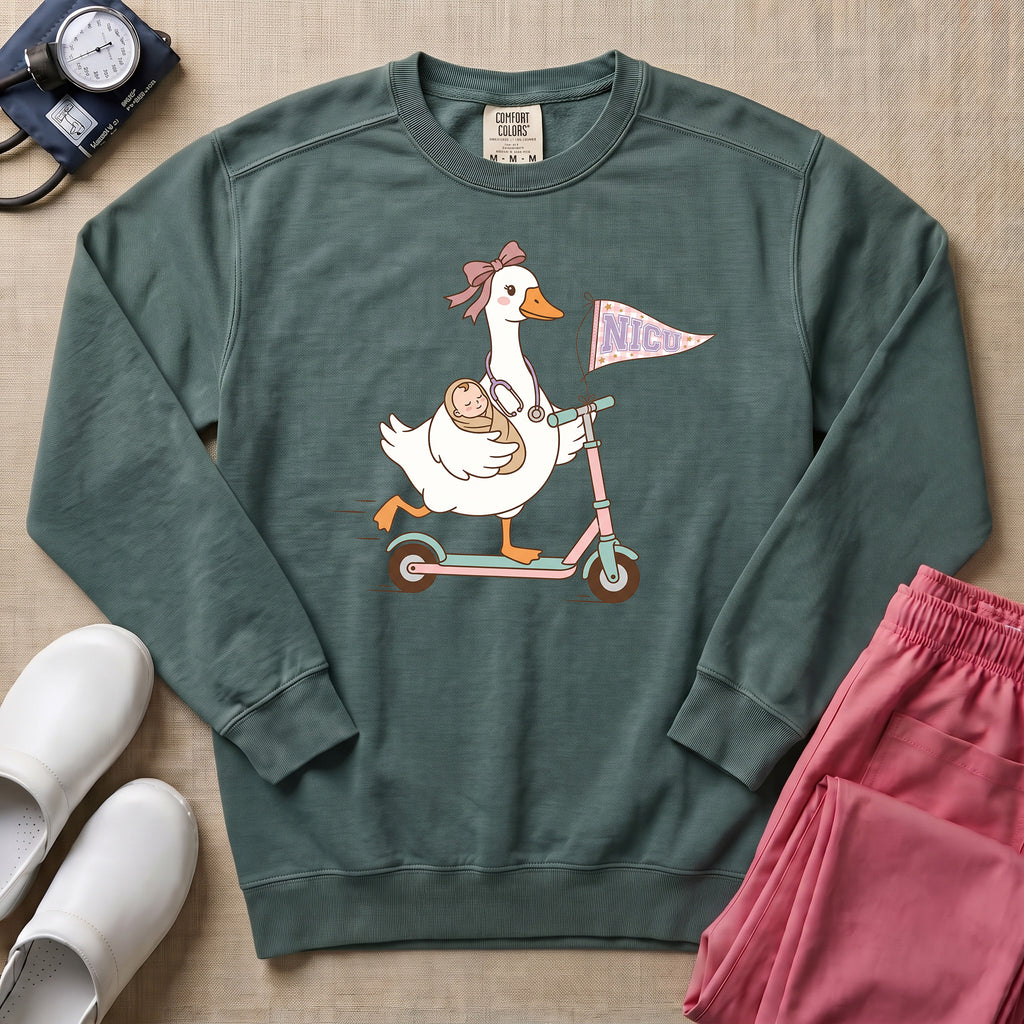 Coquette Goose Riding Scooter NICU Nurse Sweatshirt - Blue Spruce Comfort Colors Sweatshirt | HugTee