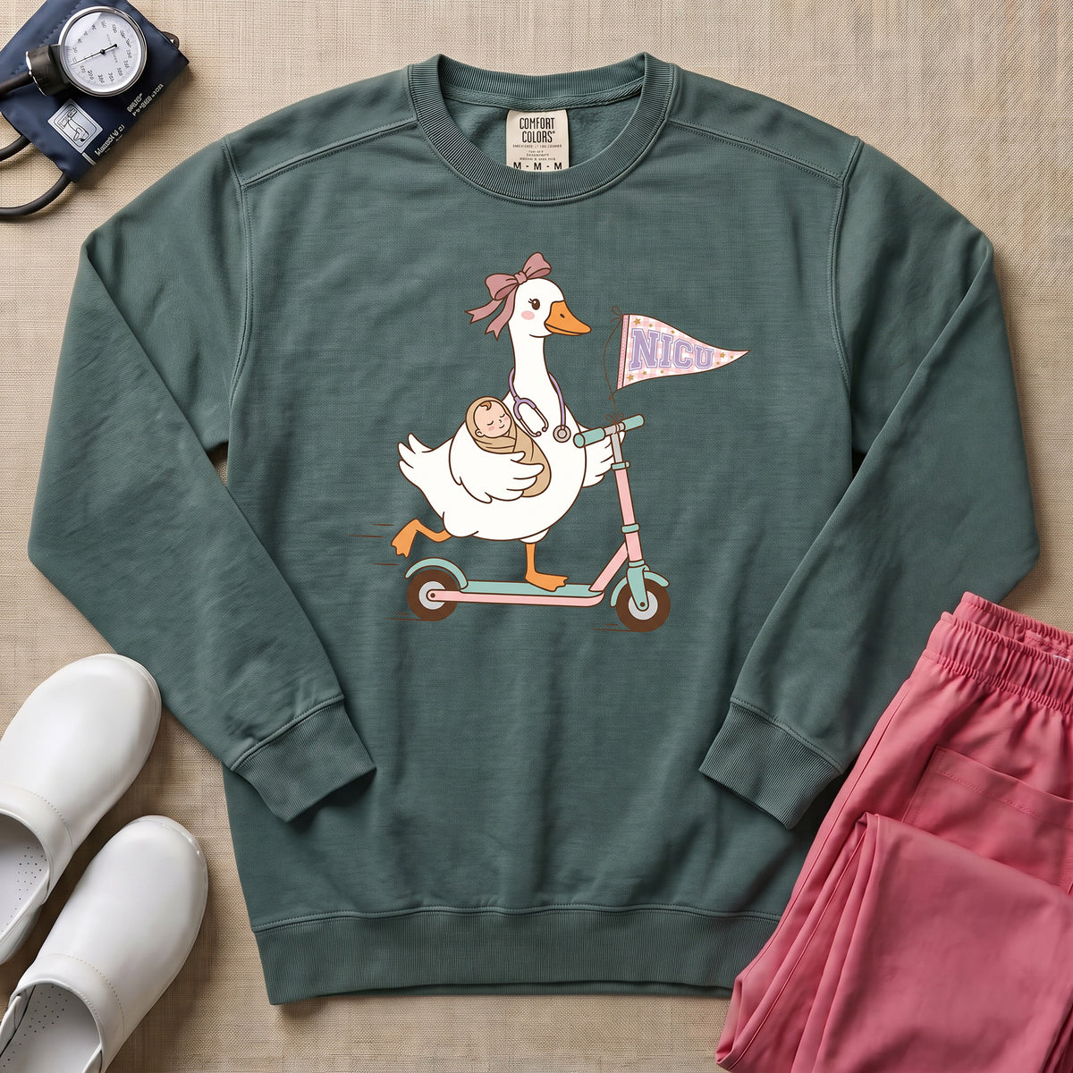 Coquette Goose Riding Scooter NICU Nurse Sweatshirt - Blue Spruce Comfort Colors Sweatshirt | HugTee