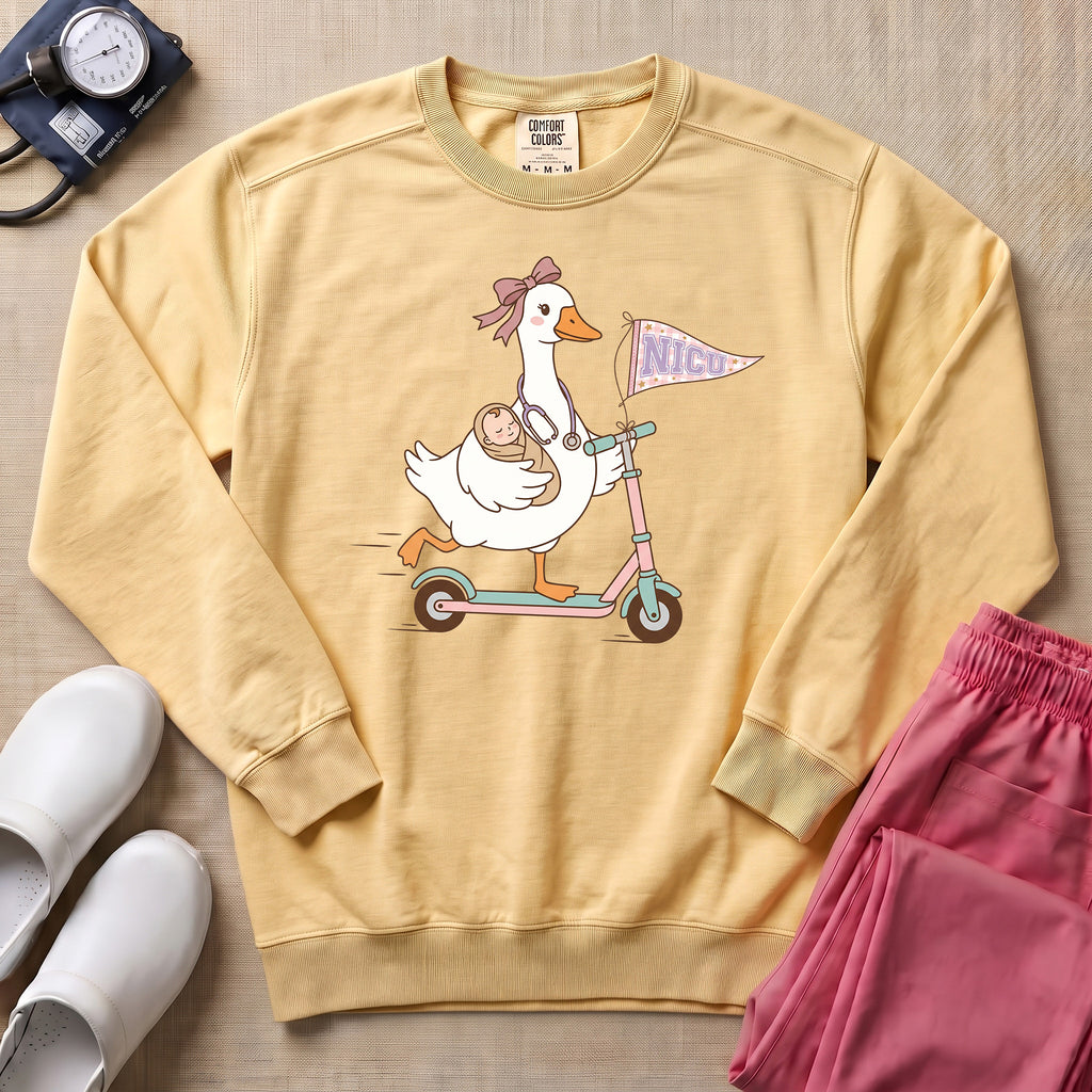 Coquette Goose Riding Scooter NICU Nurse Sweatshirt - Butter Comfort Colors Sweatshirt | HugTee