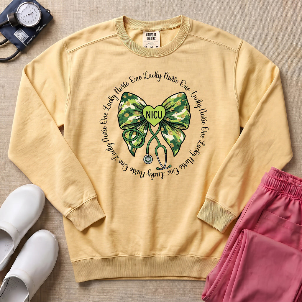 One Lucky Nurse Camo Bow NICU Sweatshirt - Butter Comfort Colors Sweatshirt | HugTee