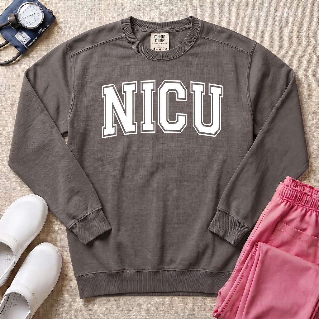 Classic Collegiate NICU Nurse Sweatshirt - Pepper Lifestyle Hero Mockup | HugTee