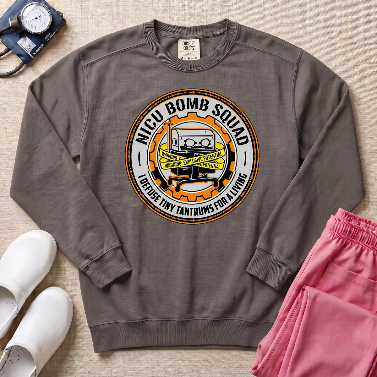 Funny NICU Bomb Squad Nurse Sweatshirt - Pepper Lifestyle Hero Mockup | HugTee