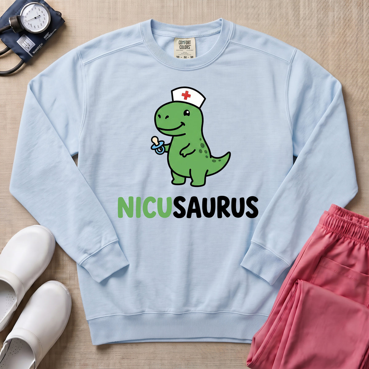 Funny NICUSAURUS Dinosaur Nurse Cute NICU Sweatshirt - Chambray Comfort Colors Sweatshirt | HugTee