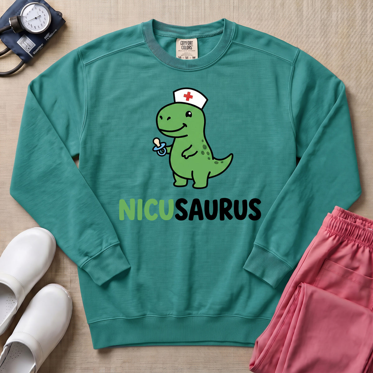 Funny NICUSAURUS Dinosaur Nurse Cute NICU Sweatshirt - Seafoam Comfort Colors Sweatshirt | HugTee