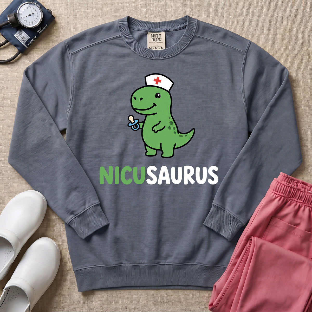 Funny NICUSAURUS Dinosaur Nurse Cute NICU Sweatshirt - Blue Jean Comfort Colors Sweatshirt | HugTee