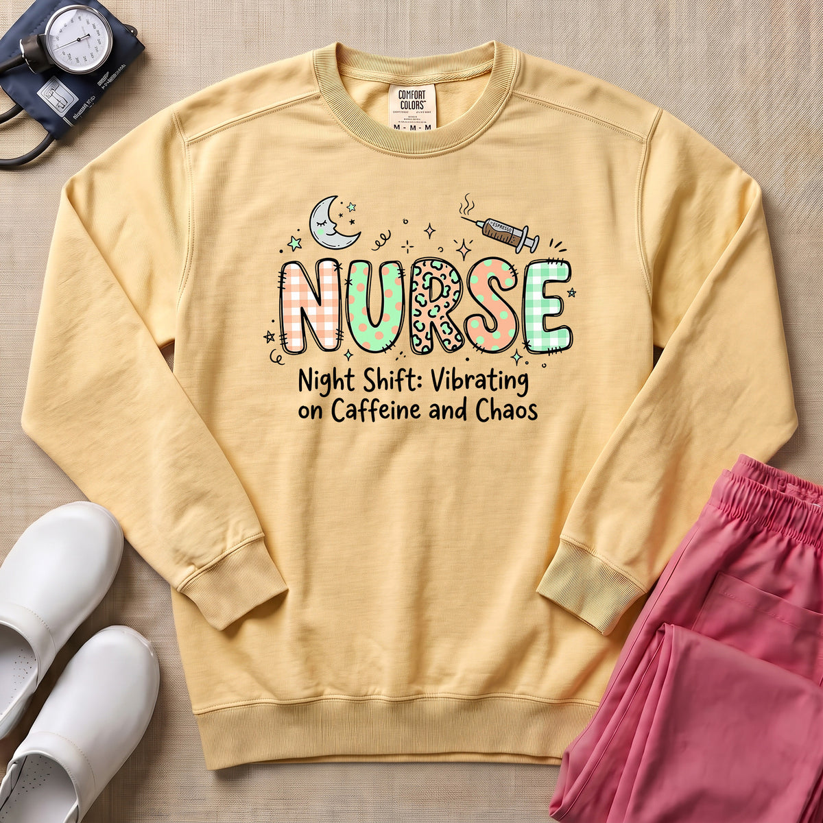 Nurse Night Shift Vibrating on Caffeine and Chaos Sweatshirt - Butter Comfort Colors Sweatshirt | HugTee