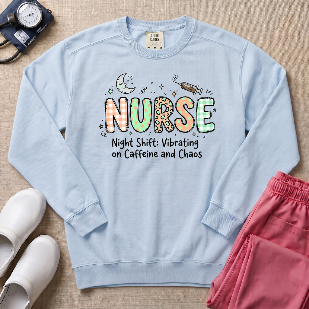 Nurse Night Shift Vibrating on Caffeine and Chaos Sweatshirt - Chambray Comfort Colors Sweatshirt | HugTee
