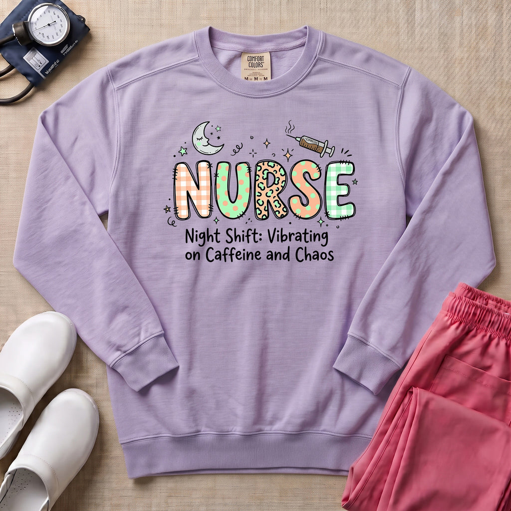 Nurse Night Shift Vibrating on Caffeine and Chaos Sweatshirt - Orchid Comfort Colors Sweatshirt | HugTee