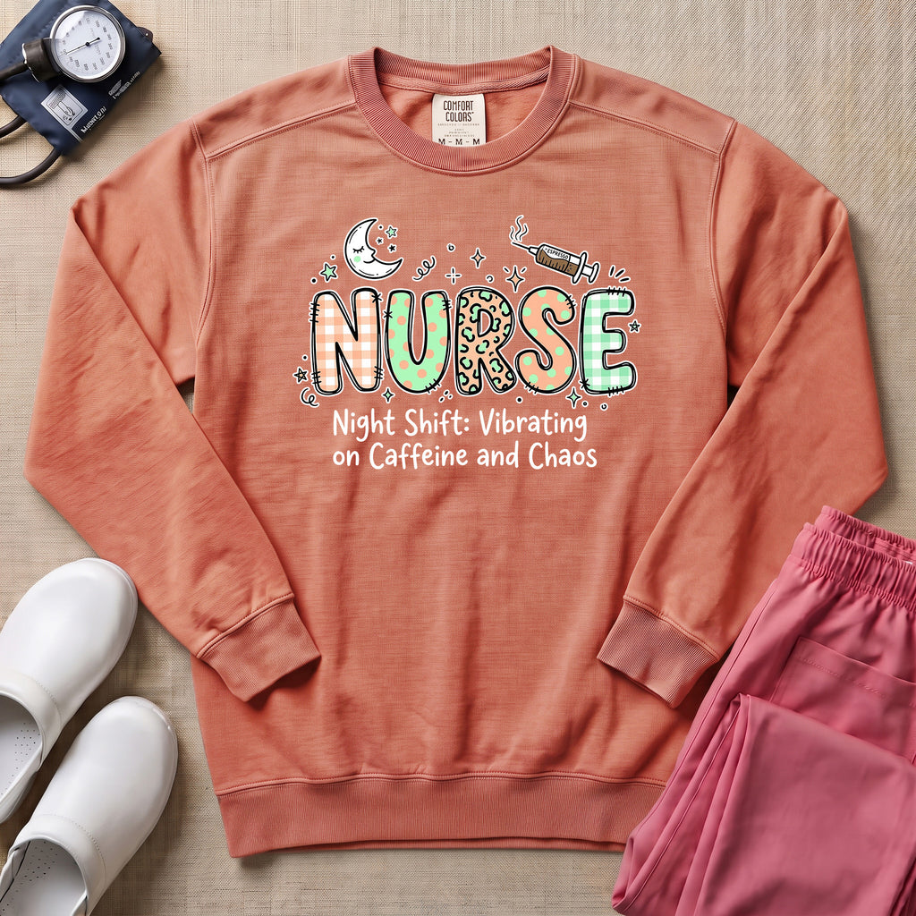 Nurse Night Shift Vibrating on Caffeine and Chaos Sweatshirt - Terracotta Comfort Colors Sweatshirt | HugTee