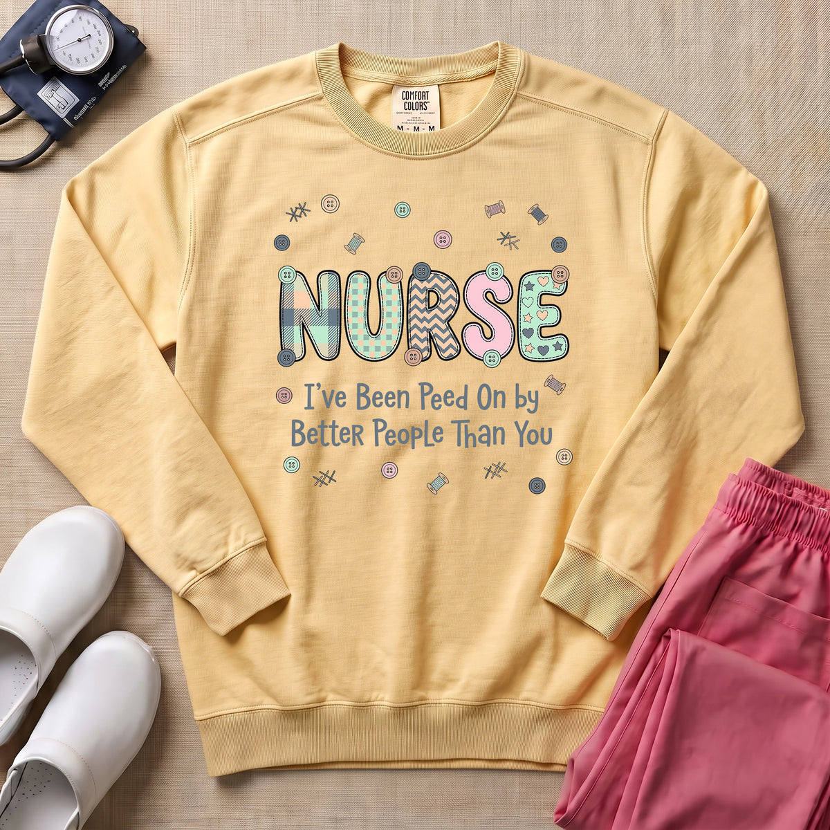 Funny Nurse I've Been Peed On By Better People Than You Sweatshirt - Butter Comfort Colors Sweatshirt | HugTee