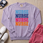 Retro Stacked Colorful Nurse Sweatshirt - Orchid Comfort Colors Sweatshirt | HugTee