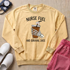 Nurse Fuel And Survival Juice Skeleton Coffee Night Shift Sweatshirt - Butter Comfort Colors Sweatshirt | HugTee