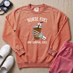 Nurse Fuel And Survival Juice Skeleton Coffee Night Shift Sweatshirt - Terracotta Comfort Colors Sweatshirt | HugTee