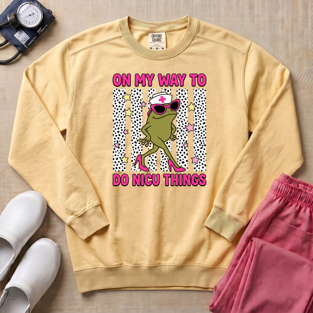 Funny Sassy Frog On My Way To Do NICU Things Nurse Sweatshirt - Butter Comfort Colors Sweatshirt | HugTee