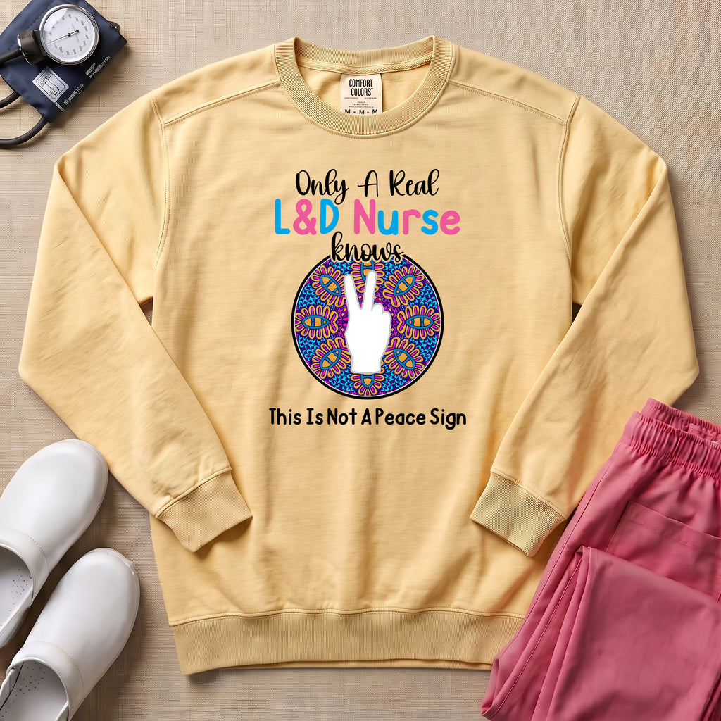 Only A Real L&D Nurse Knows This Is Not A Peace Sign Sweatshirt - Butter Comfort Colors Sweatshirt | HugTee