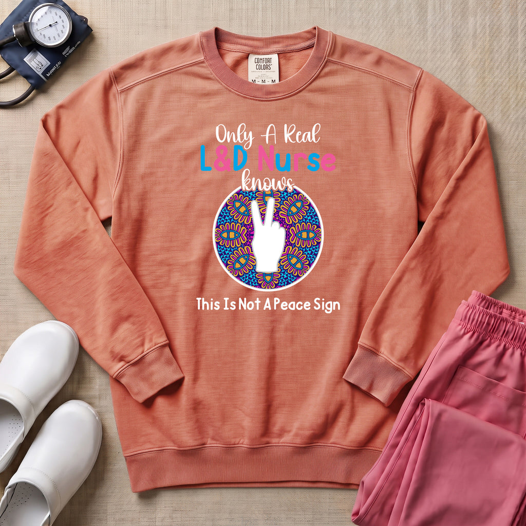 Only A Real L&D Nurse Knows This Is Not A Peace Sign Sweatshirt - Terracotta Comfort Colors Sweatshirt | HugTee