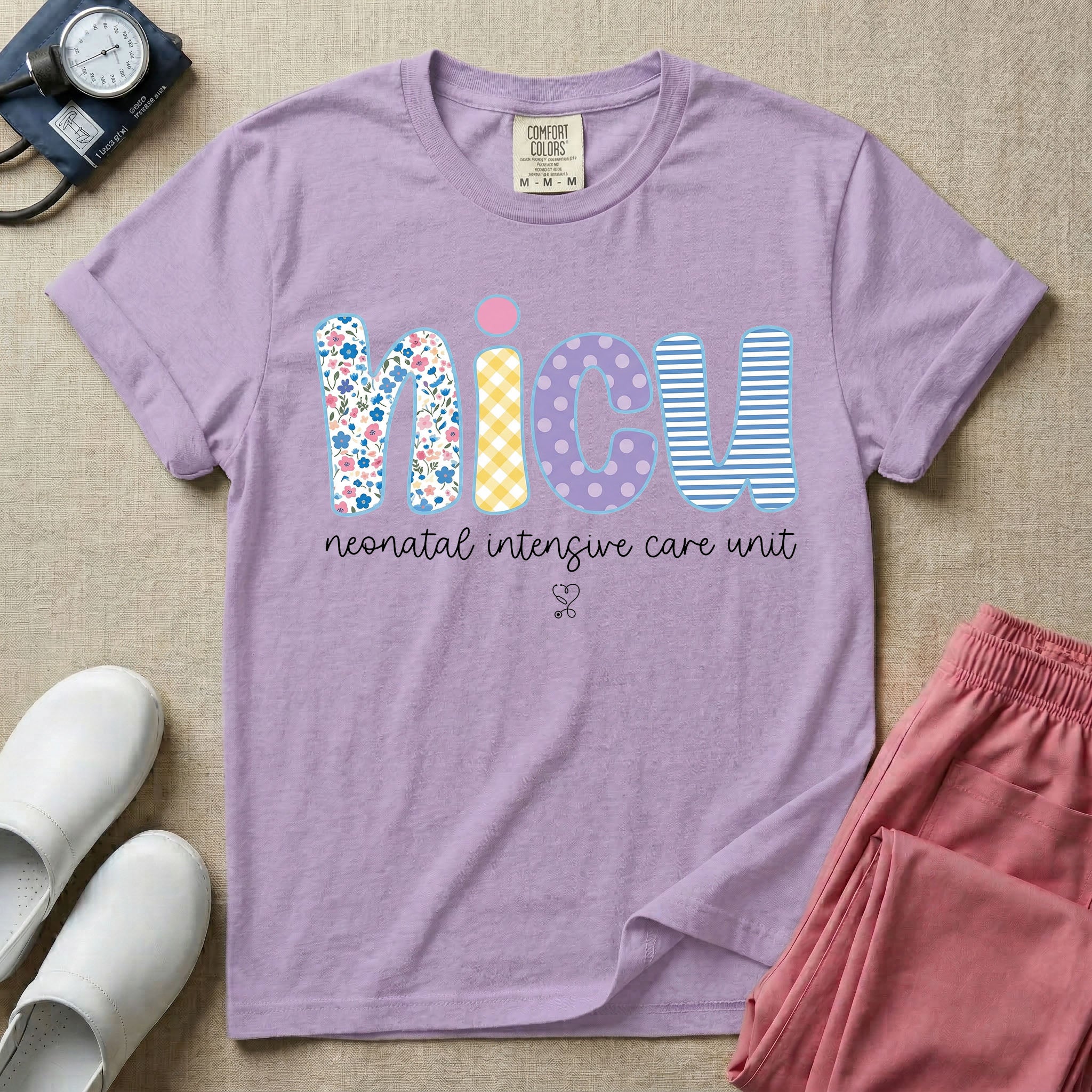 Neonatal Intensive Care Unit NICU nurse t-shirt with boho floral block letters in orchid color.
