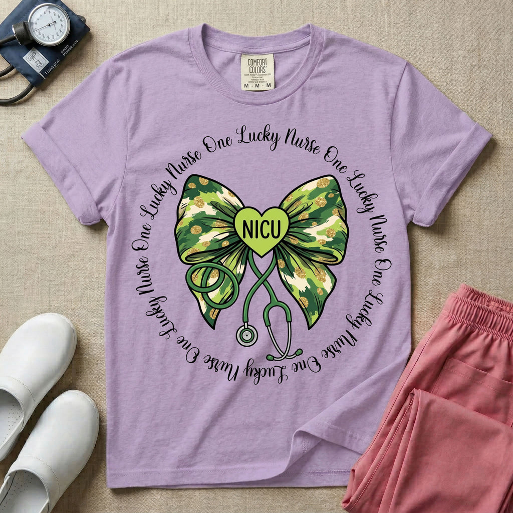 A graphic for a Neonatal Intensive Care Unit featuring a green camouflage bow with a stethoscope dangling from the bottom, a green heart in the center reading 'NICU', and the phrase 'One Lucky Nurse' repeating in a circle around the design.