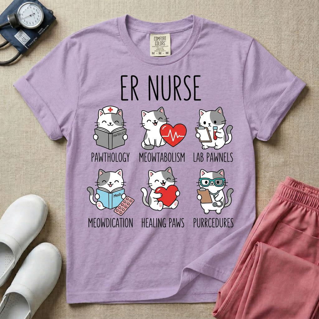 A funny t-shirt for emergency room nurses featuring the text "ER NURSE" above a grid of six cute cartoon cats demonstrating medical puns, including a cat reading for "PAWTHOLOGY", a cat with an ECG heart for "MEOWTABOLISM", a cat holding a test tube for "LAB PAWNELS", a cat with pills for "MEOWDICATION", a cat holding a heart for "HEALING PAWS", and a cat with a stethoscope for "PURRCEDURES".