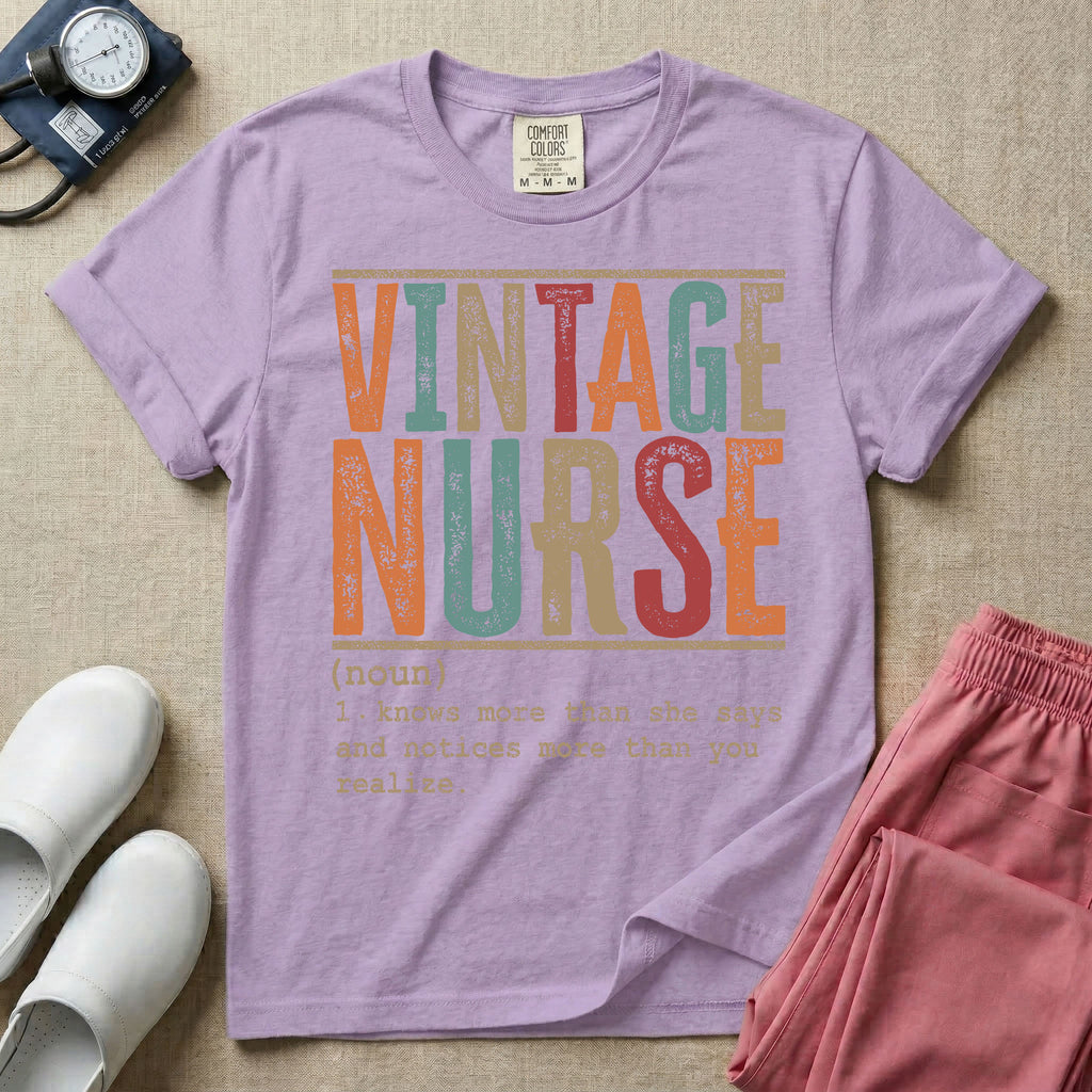 A humorous General Nursing graphic featuring large distressed retro-style block letters spelling VINTAGE NURSE, positioned above a dictionary-style definition in white typewriter font that reads (noun) 1. knows more than she says and notices more than you realize.