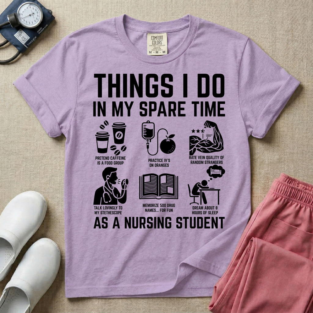 A t-shirt featuring the text THINGS I DO IN MY SPARE TIME AS A NURSING STUDENT surrounded by humorous line-art icons depicting studying, drinking coffee, and lacking sleep.