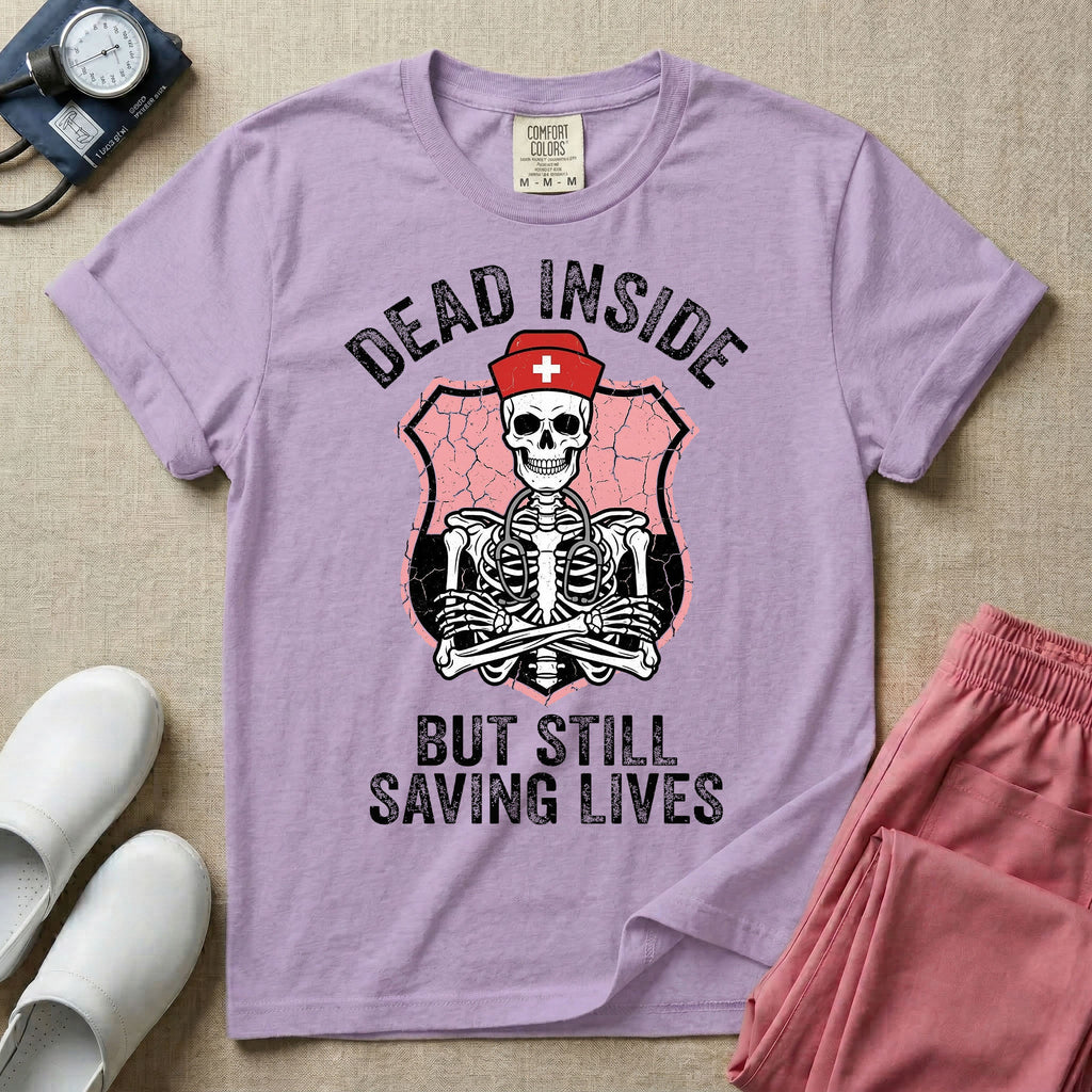General nursing nurse t-shirt with a funny skeleton dead inside but still saving lives graphic in orchid color.