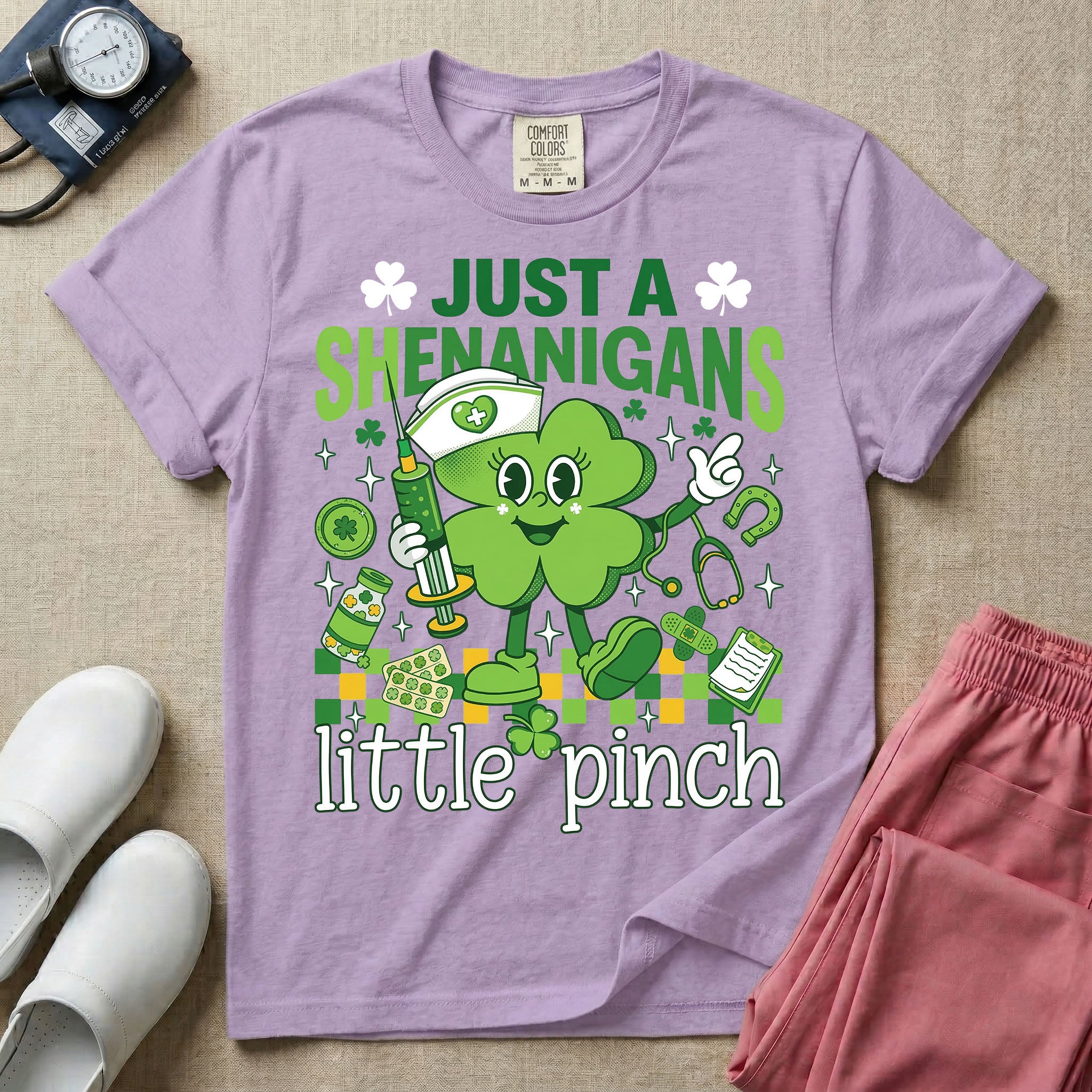 General nursing nurse t-shirt with a retro clover just a shenanigans little pinch graphic in orchid color.
