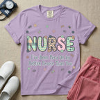 A humorous t-shirt for nurses featuring the word "NURSE" in colorful boho patterned letters above the funny phrase "I've Been Peed On by Better People Than You", surrounded by small abstract floral shapes.