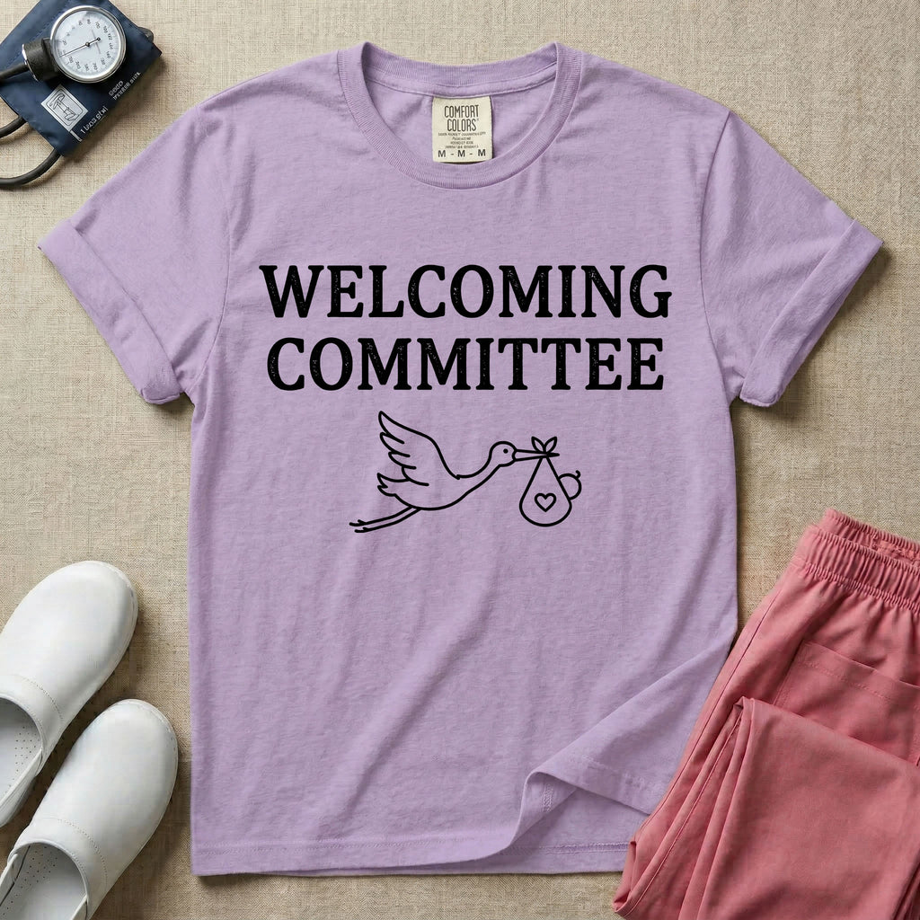 Labor and Delivery nurse graphic featuring a simple white outline of a flying stork carrying a baby bundle with a heart, placed below the text WELCOMING COMMITTEE.