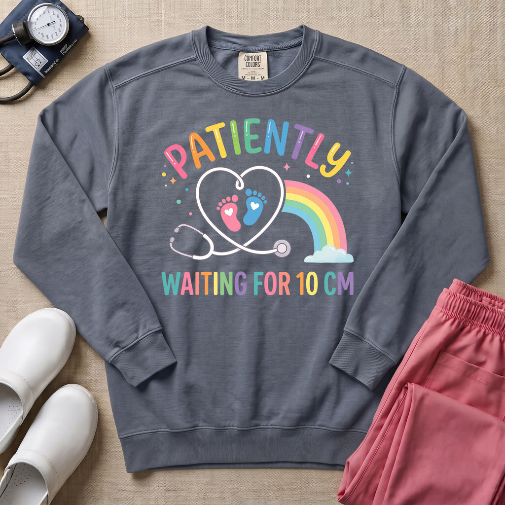 Patiently Waiting For 10 CM Rainbow L&D Nurse Midwife Sweatshirt - Blue Jean Comfort Colors Sweatshirt | HugTee