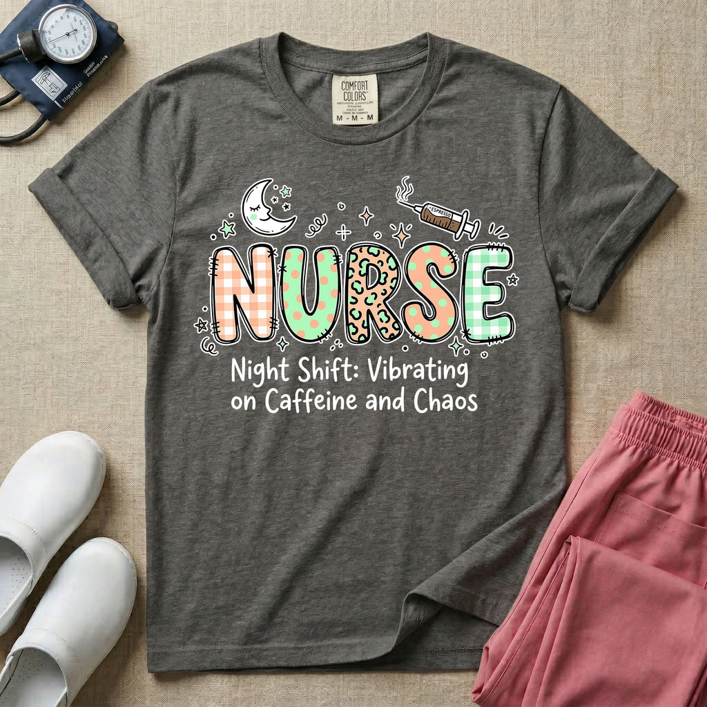 A humorous General Nursing graphic featuring the word NURSE in large, playfully patterned letters including plaid, leopard print, and floral designs, accented by a sleeping crescent moon and a syringe, positioned above text that reads Night Shift: Vibrating on Caffeine and Chaos.