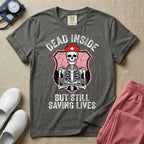 General nursing nurse t-shirt with a funny skeleton dead inside but still saving lives graphic in pepper color.