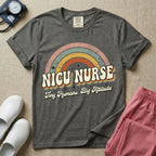 Neonatal Intensive Care Unit NICU nurse t-shirt with a retro vintage rainbow and tiny humans big attitude graphic in pepper color.