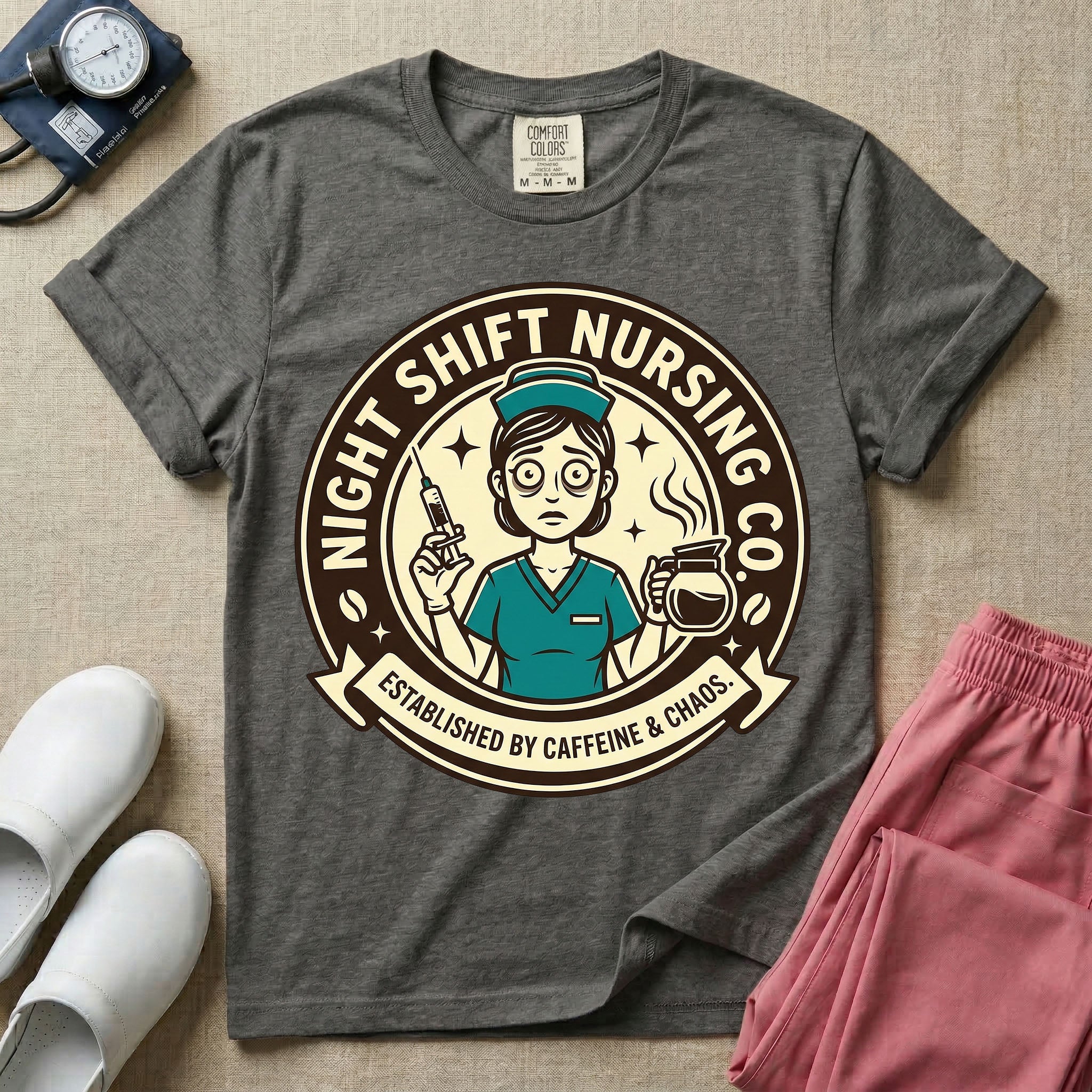 General nursing night shift nurse t-shirt with a retro vintage exhausted nurse holding coffee and a syringe established by caffeine and chaos graphic in pepper color.